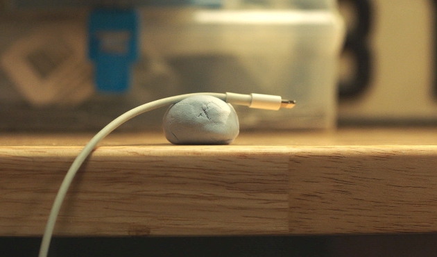 Blu Tack secures Apple Lightning cable