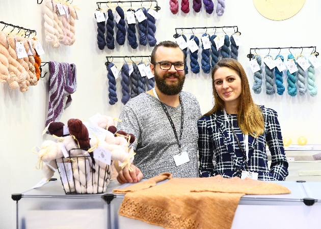 Staff on a stand at The Knitting & Stitching Show