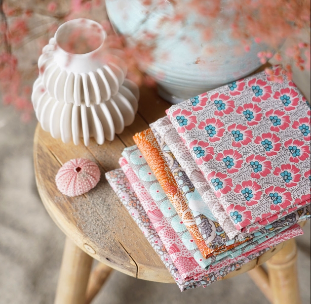 selection of patterned fabric on a stool