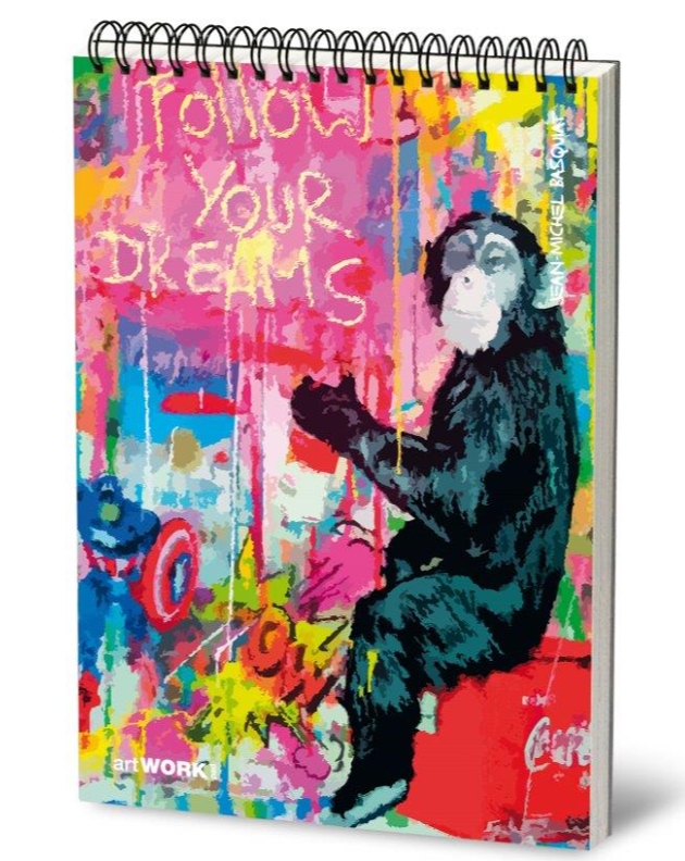 brightly coloured spiral bound notebook with chimpanzee on cover