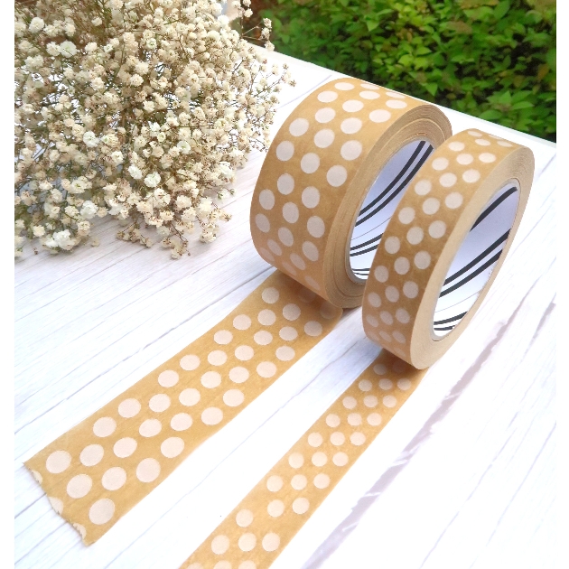 Roll of white spotted kraft tape