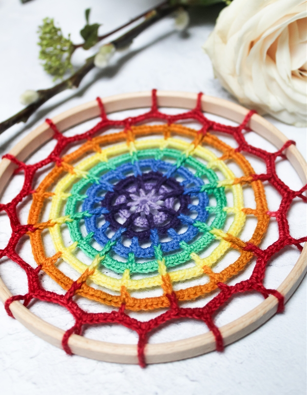 rainbow coloured crochet mandala