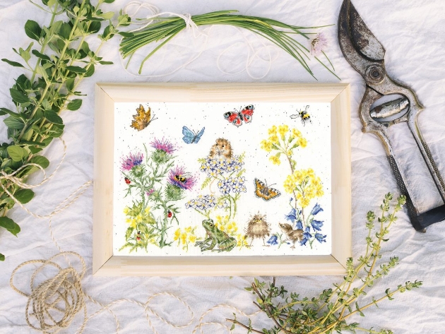 cross stitch of meadow with butterflies