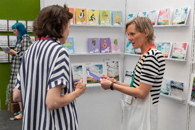 ladies chatting at exhibition hall