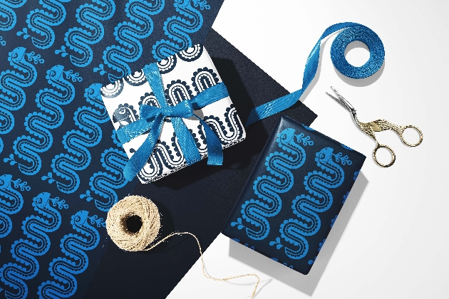 giftwrapped present wrapped in blue ribbon