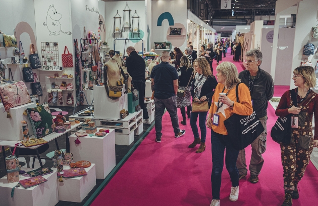 visitors browsing products at trade fair