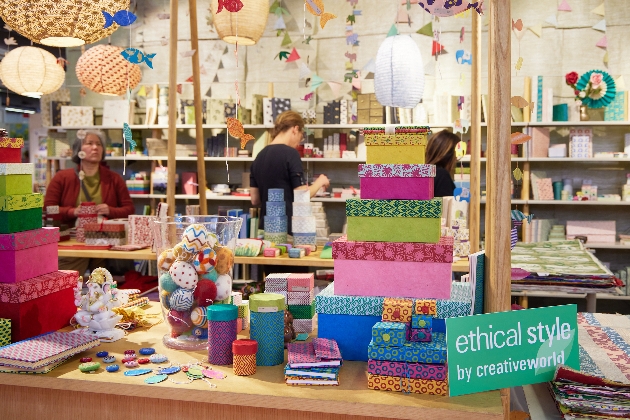 Bright boxes stacked on exhibitor stand at trade show