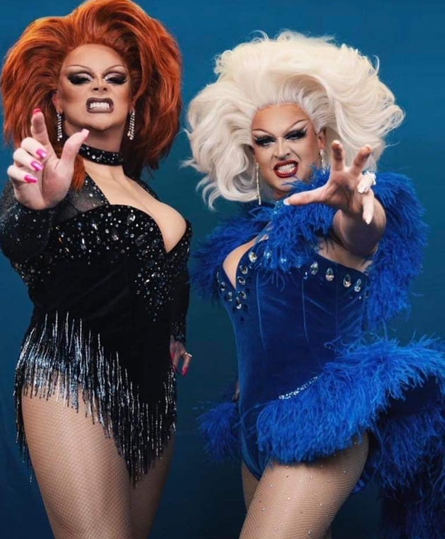 Two drag queens posing