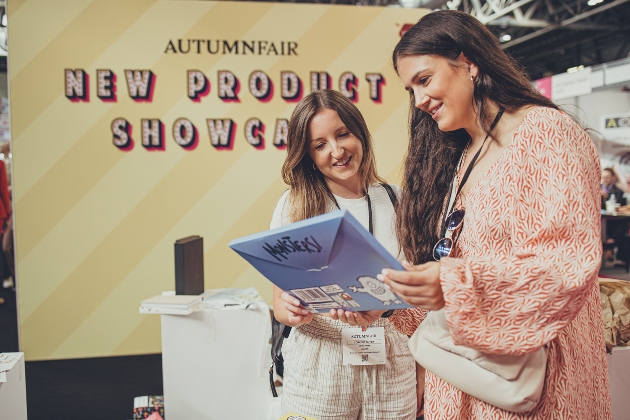 two ladies chatting at trade show stand