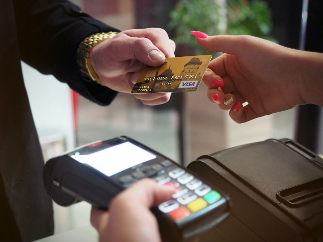 Customer paying at the till 