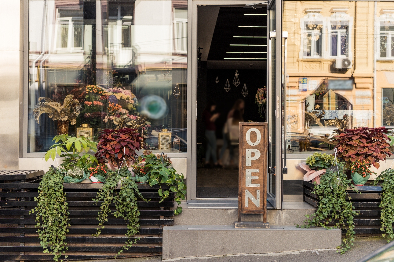 pop up plant shop with sign outside 