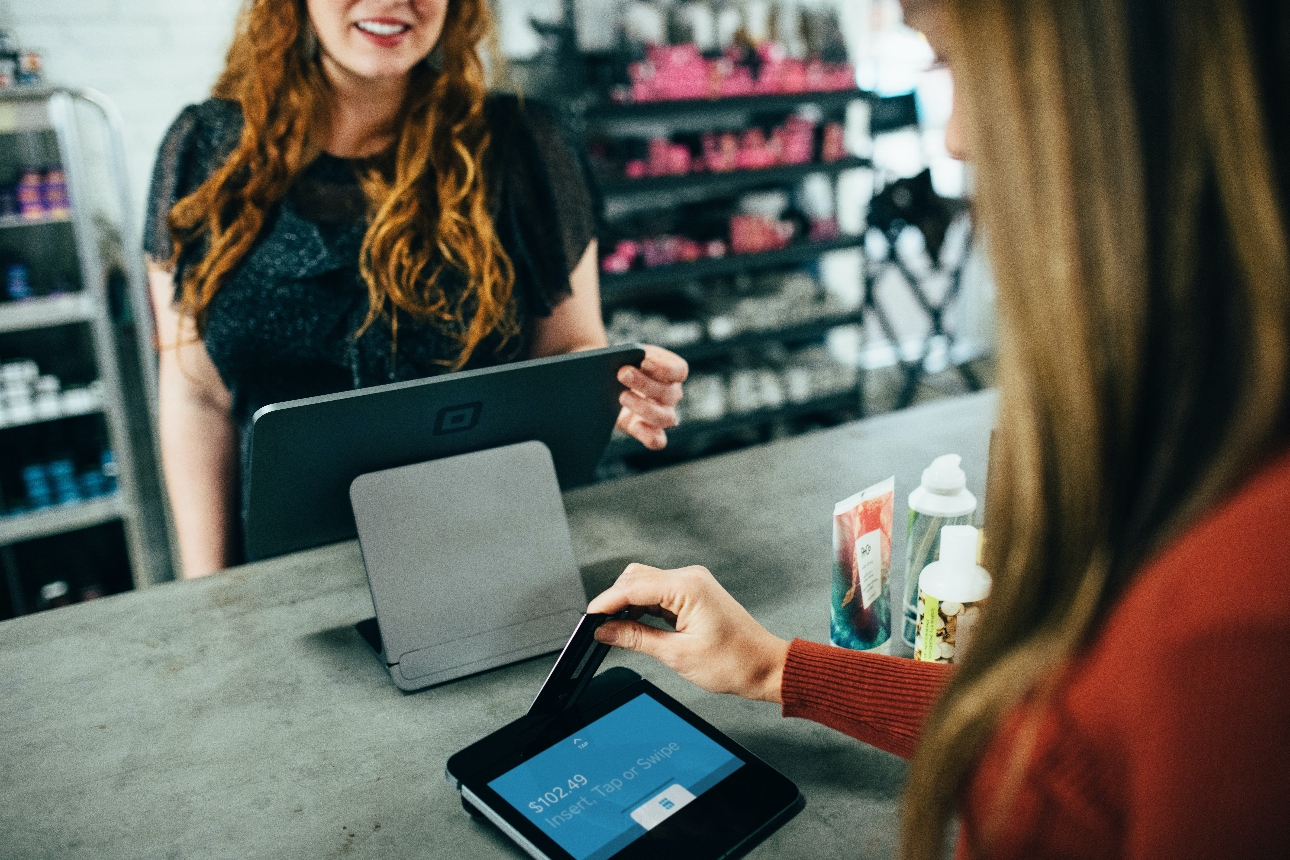 card being scanned at checkout