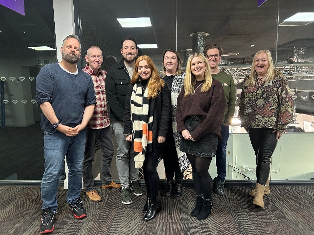 group photograph of people in an office