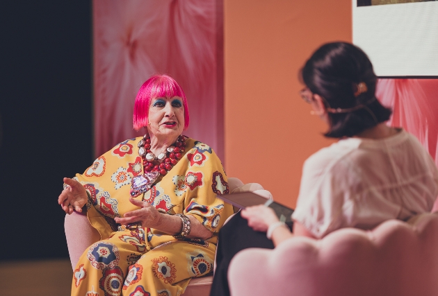 Dame Zandra Rhodes giving a talk on stage