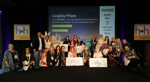 award winners standing on a stage