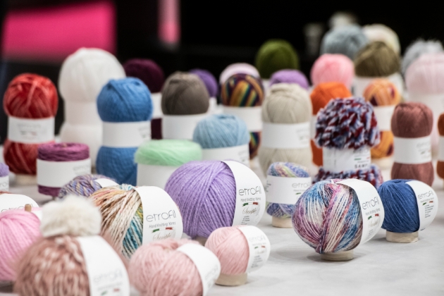 bundles of yarn on a table
