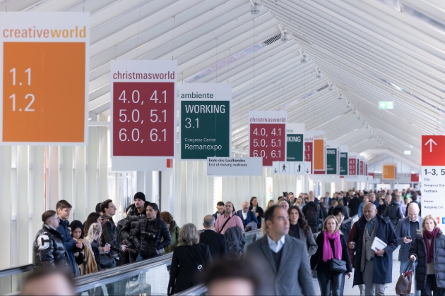 people walking up the corridors of Creativeworld trade show