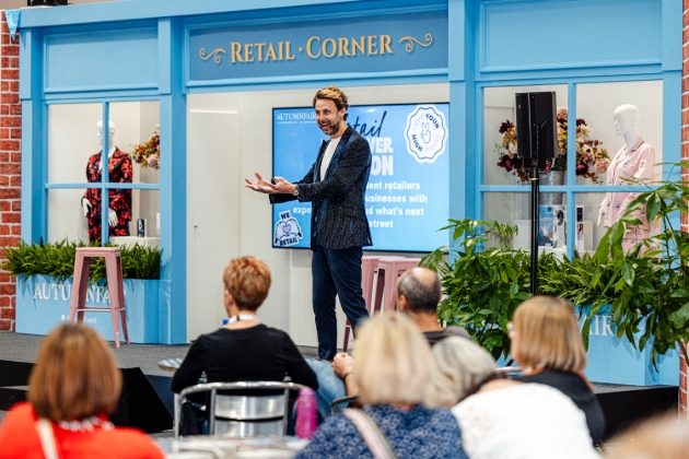 guest speaker on stage at trade show