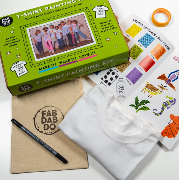 flatlay of white t shirt and painting kit
