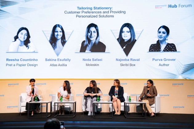 panel of speakers at trade show