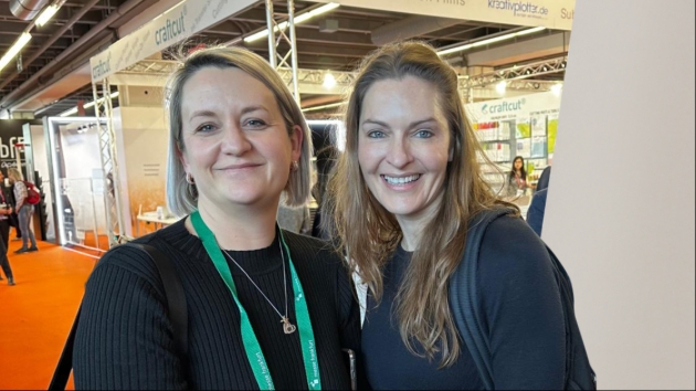 two ladies smiling for the camera