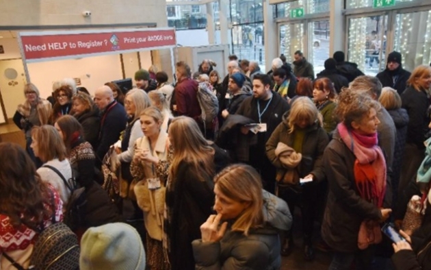 busy corridor of bustling people at trade fair